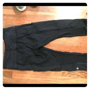 Lululemon black crop. Tons of pockets! Size 4